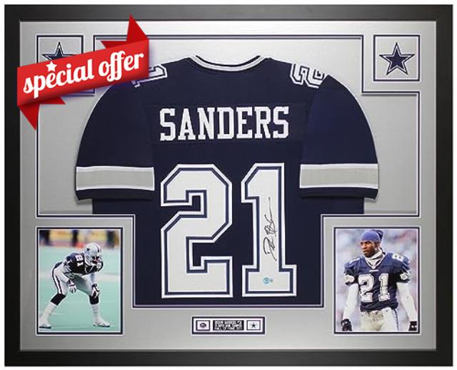 Deion Sanders Autographed Blue Dallas Jersey - Beautifully Matted and Framed - Hand Signed By Deion and Certified Authentic by Beckett - Includes Certificate of Authenticity