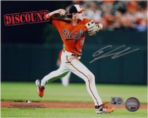 Gunnar Henderson Baltimore Orioles Autographed 8" x 10" Orange Jersey Throwing Photograph - Autographed MLB Photos