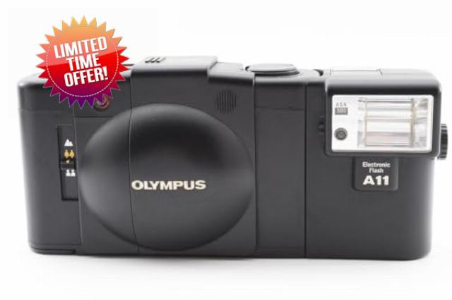 Olympus XA2 35MM Rangefinder film camera with Flash attachment. For Color & B&W film (Renewed)