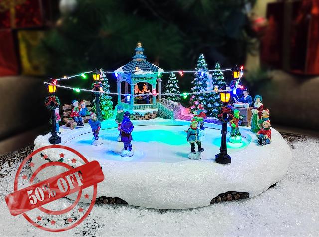 MOMENTS IN TIME 7.28”H Animated Skating Pond (Moving Skaters) - LED Lights