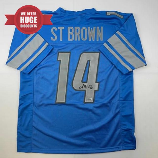 Autographed/Signed Amon-Ra St. Brown Detroit Blue Football Jersey Beckett BAS COA