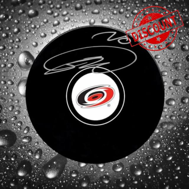 Sebastian Aho Carolina Hurricanes Autographed Puck - Autographed NHL Pucks