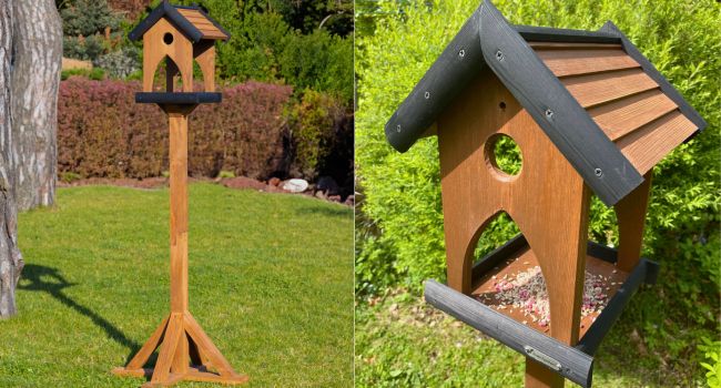 charcoal roofed wooden bird table in garden