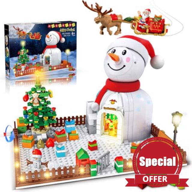 HOGOKIDS Christmas Santa House Building Set with LED Light - 566 PCS Wintertime Snowman Building Block Kit Xmas Tree Decors Birthday Toys for Teens Kids Girls Boys 6 7 8 9+ Years Old