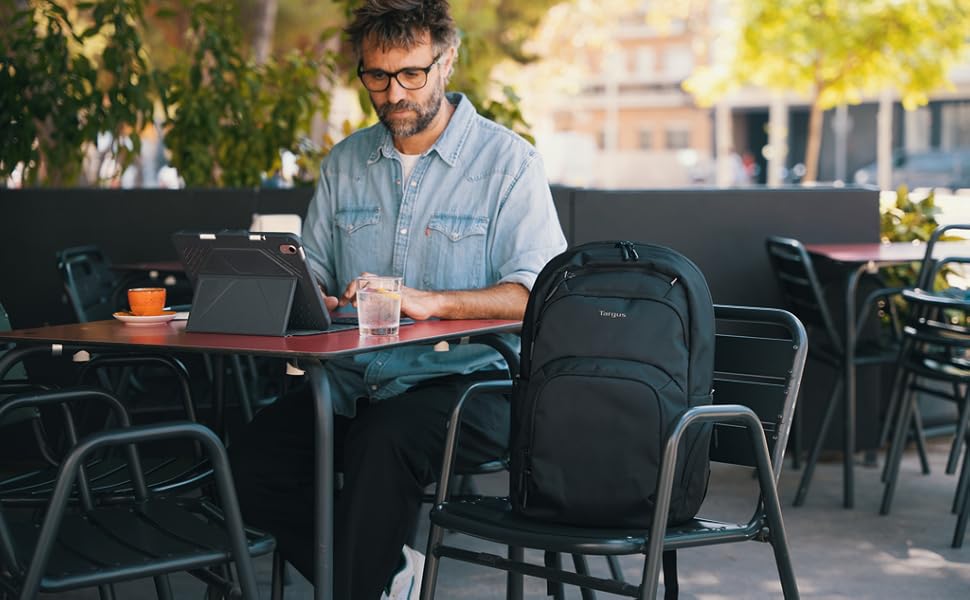 Targus laptop backpack on man outside commuting