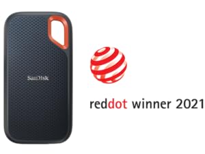 Portable SSD lying next to camera