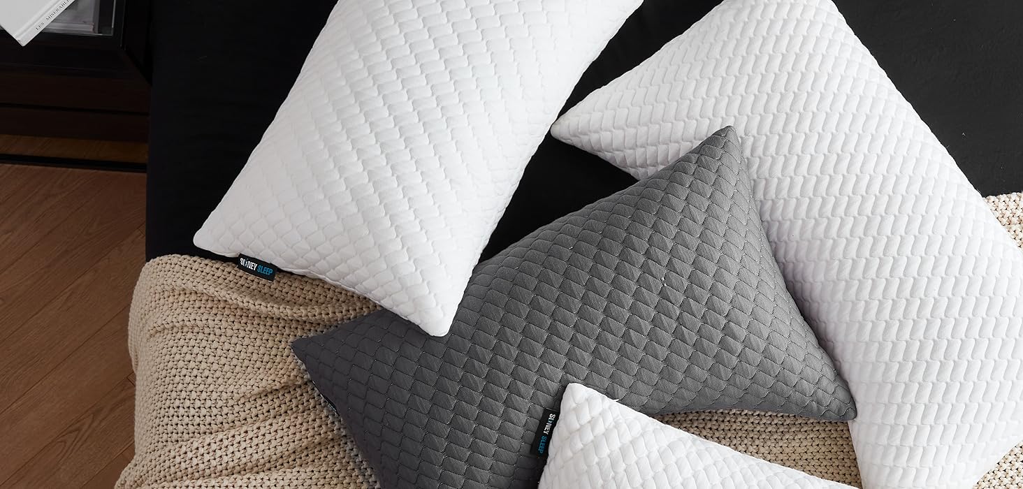 side sleeper bed pillows grey and white mixed