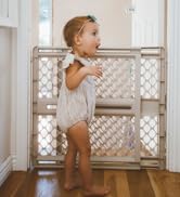 Mom opens gate for baby in superyard colorplay ultimate