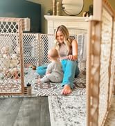 Mom outside with baby in superyard colorplay