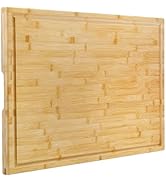 Large rectangular wooden cutting board with juice grooves around the perimeter and smooth bamboo grain finish. Shown from multiple angles.