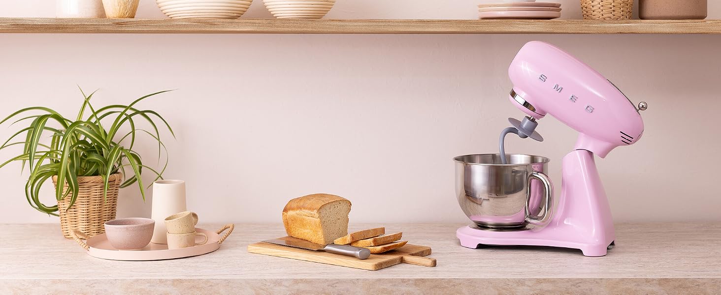 Pink Standmixer on Counter with bread