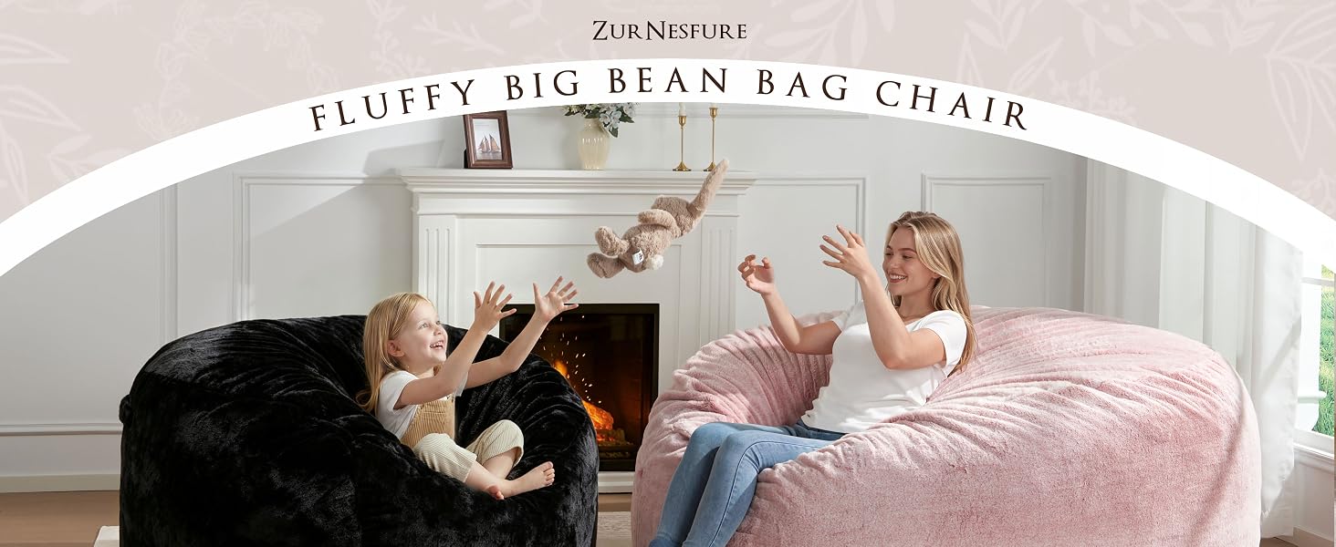 mom and girl are playing on the black and pink bean bag chair