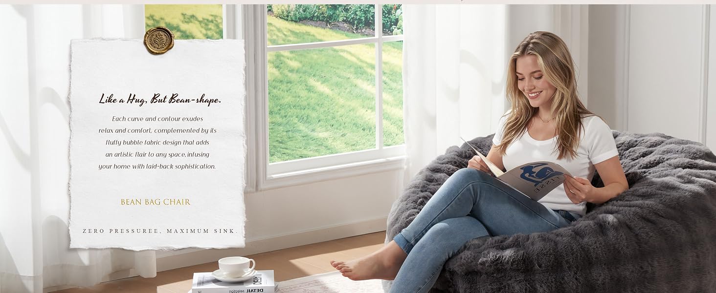 The girl is sitting on a darkgrey beanbag chair reading a book