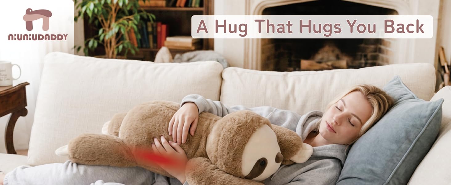 Woman sleeping on couch hugging a large Niuniu Daddy sloth weighted stuffed animal.
