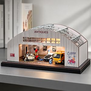 Close view of the arched facade, printed ANTIQUES sign and acrylic roof trusses